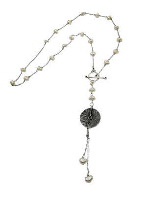 Necklace with chain and pearls.