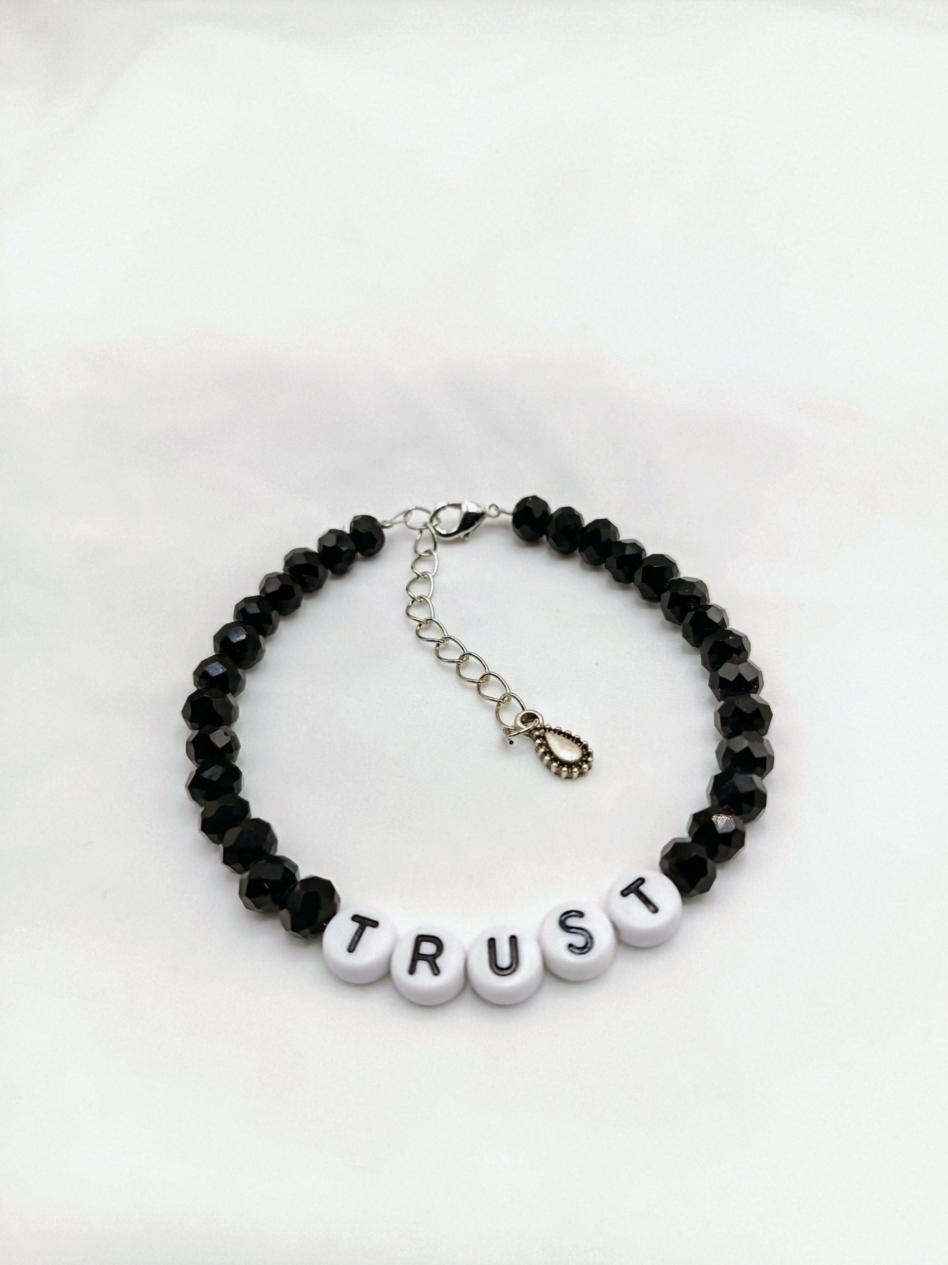 Handmade Black Bead Bracelet with "TRUST" Letters